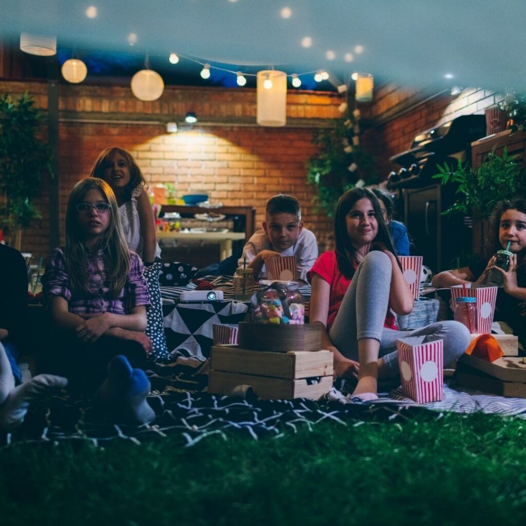 family in backyard at night
